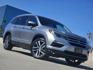 Used 2017 Honda Pilot Touring image 1