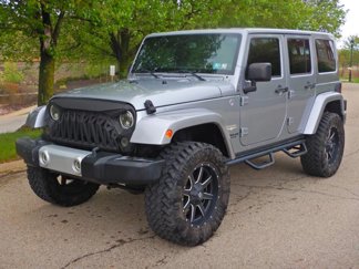 Used 2014 Jeep Wrangler Unlimited Sahara w/ Max Tow Package image 1