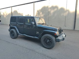 Used 2015 Jeep Wrangler Unlimited Sahara w/ Connectivity Group image 1