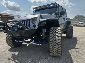 Used 2014 Jeep Wrangler Unlimited Sport image 1