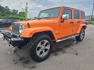 Used 2012 Jeep Wrangler Unlimited Sahara w/ Mopar Chrome Edition Group image 1
