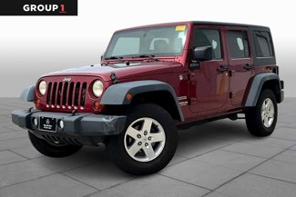 Used 2012 Jeep Wrangler Unlimited Sport image 1