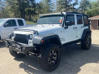 Used 2015 Jeep Wrangler Unlimited Sport image 1