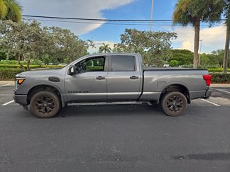 Used 2019 Nissan Titan SV w/ Midnight Edition image 1
