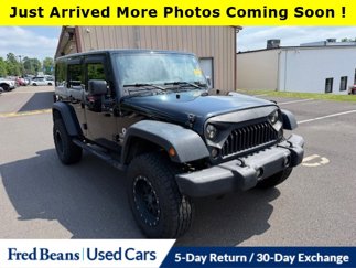 Used 2013 Jeep Wrangler Unlimited Sport image 1