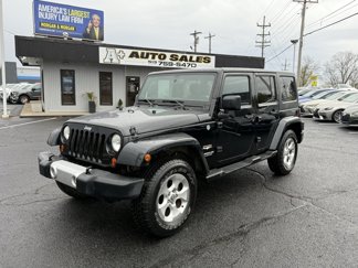 Used 2013 Jeep Wrangler Unlimited Sahara image 1