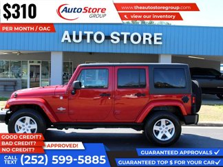 Used 2014 Jeep Wrangler Unlimited Sport image 1