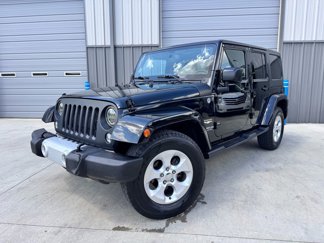 Used 2015 Jeep Wrangler Unlimited Sahara image 1