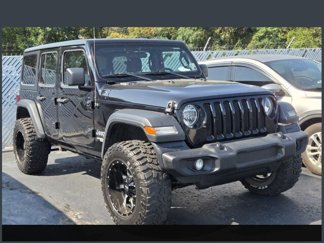 Used 2018 Jeep Wrangler Unlimited Sport image 1