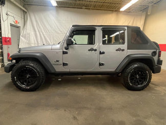 Used 2013 Jeep Wrangler Unlimited Sport image 1
