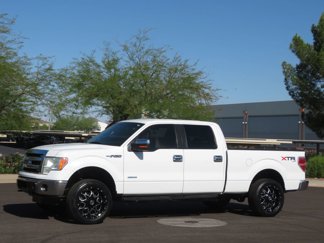 Used 2014 Ford F150 4x4 SuperCrew image 1