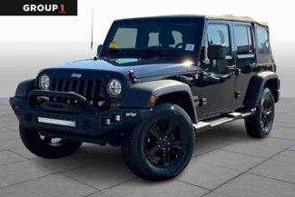 Used 2013 Jeep Wrangler Unlimited Sport image 1