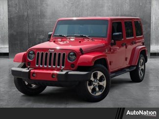 Used 2016 Jeep Wrangler Unlimited Sahara image 1