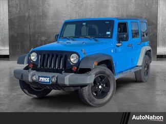 Used 2011 Jeep Wrangler Unlimited Sport image 1