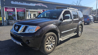 Used 2012 Nissan Pathfinder LE image 1