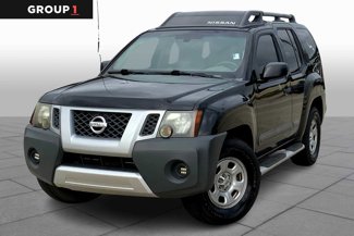 Used 2015 Nissan Xterra X image 1