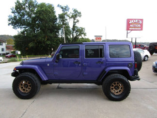 Used 2016 Jeep Wrangler Unlimited Sahara image 1