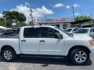 Used 2012 Nissan Titan SV w/ SV Value Truck Pkg image 1
