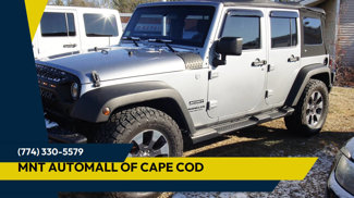 Used 2013 Jeep Wrangler Unlimited Sport image 1