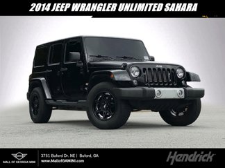 Used 2014 Jeep Wrangler Unlimited Sahara w/ Dual Top Group image 1