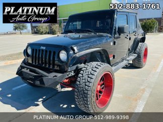 Used 2012 Jeep Wrangler Unlimited Sport image 1