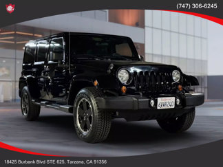 Used 2012 Jeep Wrangler Unlimited Sahara image 1