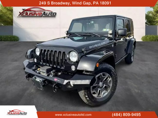 Used 2014 Jeep Wrangler Unlimited Rubicon w/ Dual Top Group image 1