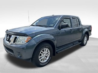 Used 2014 Nissan Frontier SV image 1