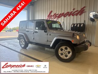 Used 2014 Jeep Wrangler Unlimited Sahara w/ Dual Top Group image 1