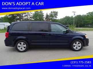 Used 2014 Dodge Grand Caravan SE image 1