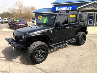 Used 2016 Jeep Wrangler Unlimited Sport image 1