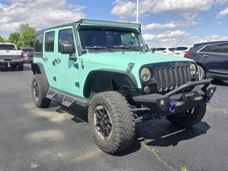 Used 2016 Jeep Wrangler Unlimited Sport image 1