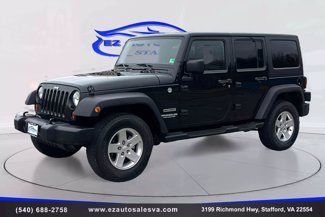 Used 2012 Jeep Wrangler Unlimited Sport image 1