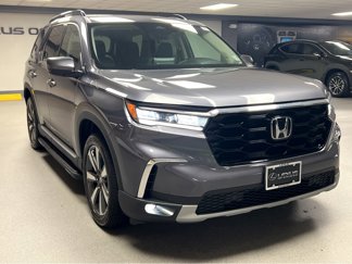 Used 2024 Honda Pilot Touring image 1