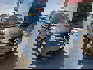 Used 2012 Dodge Grand Caravan SXT image 1