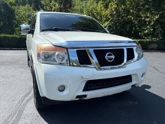 Used 2014 Nissan Armada Platinum w/ 2nd Row Captain Seat Package image 1