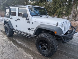 Used 2015 Jeep Wrangler Unlimited Sport image 1