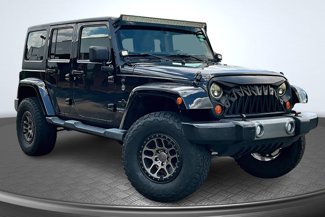 Used 2014 Jeep Wrangler Unlimited Sport image 1