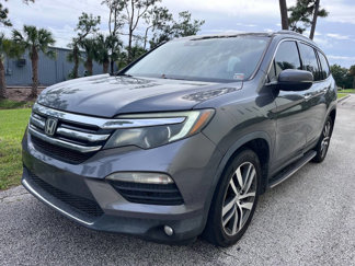 Used 2016 Honda Pilot Touring image 1