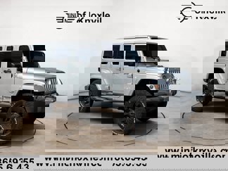 Used 2012 Jeep Wrangler Unlimited Sahara w/ Dual Top Group image 1