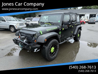 Used 2012 Jeep Wrangler Unlimited Sport image 1