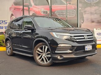 Used 2016 Honda Pilot Touring image 1