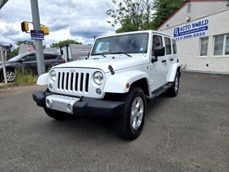 Used 2014 Jeep Wrangler Unlimited Sahara w/ Dual Top Group image 1