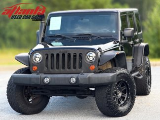 Used 2011 Jeep Wrangler Unlimited Sport image 1