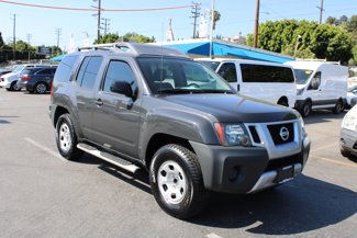 Used 2015 Nissan Xterra X image 1