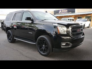 Used 2019 GMC Yukon SLT image 1
