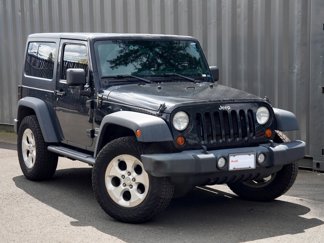 Used 2013 Jeep Wrangler Sport w/ Mopar Black Appearance Group image 1