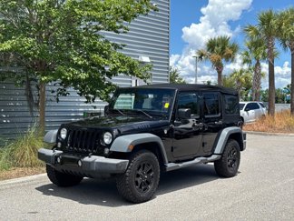 Used 2016 Jeep Wrangler Unlimited Sport image 1