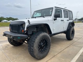 Used 2012 Jeep Wrangler Unlimited Sport image 1