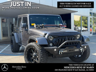 Used 2016 Jeep Wrangler Unlimited Sahara image 1